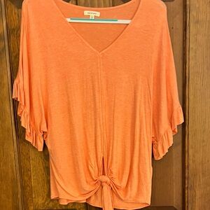 V neck shirt with ties at bottom size Large